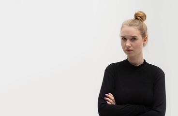 Isolated shot of a pretty offended blonde Ukrainian girl purses lips, having an insulted negative...