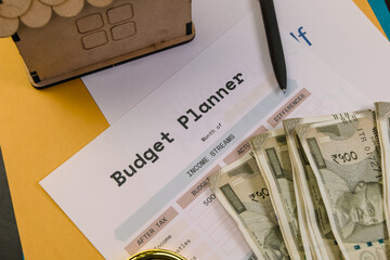 Budget planning with currency and financial tools on table