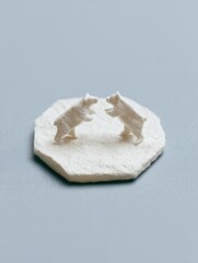 Two White Bear Figurines Engaged in Playful Interaction on Background