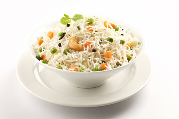 Fresh steaming Vegetable Rice garnished with mint leaf served in ceramic bowl