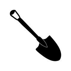 A black and white shovel in silhouette for digging in the earth