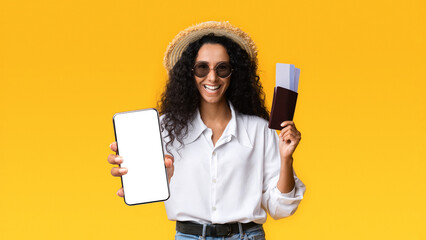 Time For Vacation. Excited Brunette Woman With Passport And Tickets Showing Thumb Up Gesture, Ready For Summer Trip, Wearing Hat And Glasses, Isolated On Yellow Background With Copy Space