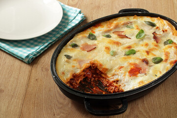 lasagne with tomato sauce and bacon
