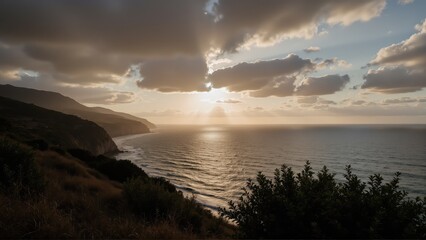 coastal cliff ocean photogenic. Serene coastal landscape at sunset, featuring hills, ocean waves, and dramatic clouds illuminated by golden light.