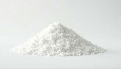 Pile of white granulated sugar on white background, beet sugar, background