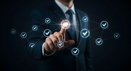 Businessman in Blue Suit Interacting with Checkmark Network on Dark Background Demonstrating Compliance and Quality Control System
