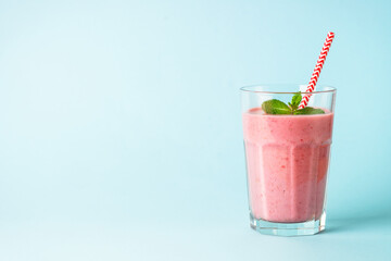 Strawberry smoothie or milkshake on white.