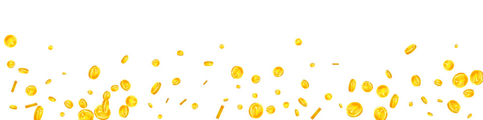 Chinese yuan coins falling. Scattered gold CNY
