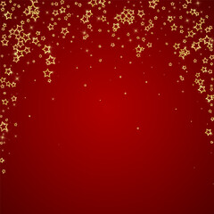 Gold sparkling star confetti.