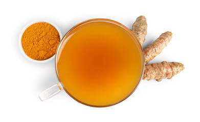 Aromatic turmeric tea in glass cup, roots and powder isolated on white, top view