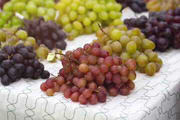 Various grape varieties on the market counter