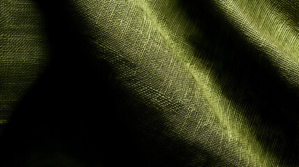 Olive green fabric texture, draped folds, dark background, studio shot, textile design