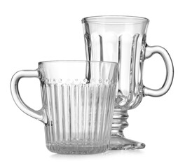 Different empty clean glasses isolated on white