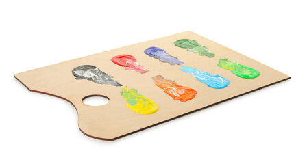 Wooden palette with paints isolated on white