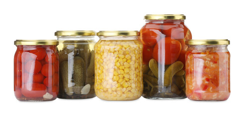Many jars with different pickled products isolated on white