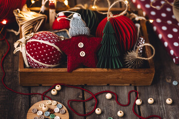 Christmas zero waste eco friendly home holiday festive decor, wooden box handmade toys with recycled or natural materials. Cozy atmosphere, ecological concept, sustainable Xmas celebration