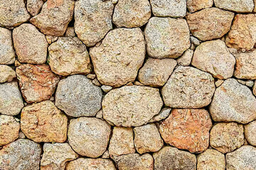 Fototapeta premium Rustic stone wall texture, outdoor background, building material, construction detail