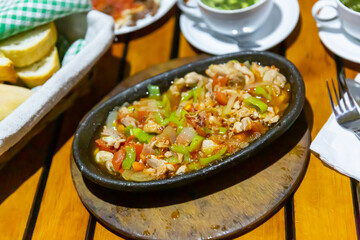Turkish sote tavuk kavurma, roasted chicken pieces with vegetables