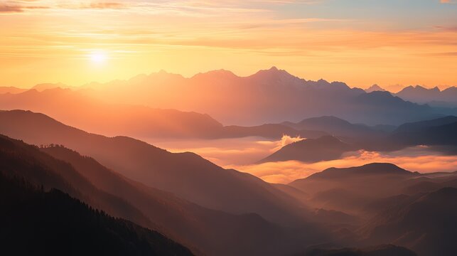 Majestic sunrise over golden mountain ranges scenic view sky rays calm wild mist hills peaks light