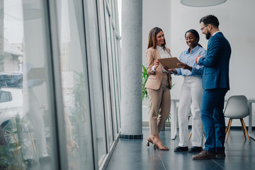 Business people discussing work in modern office building