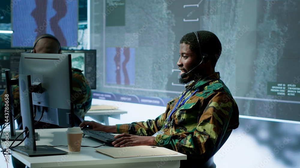 Aufkleber team of military specialists in command post monitoring satellite data, integrates real time informa