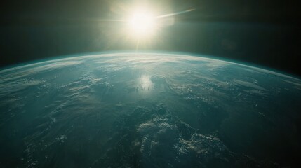 Earth from space, sun shining