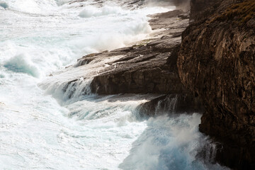 wild seas crashing against rocky coastline on Kangaroo Island, Australia