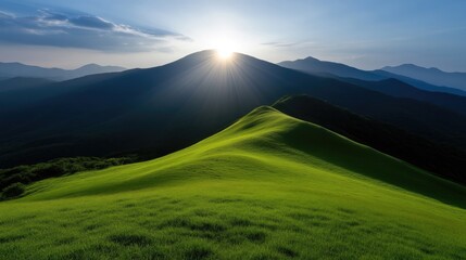 Sunrise over rolling green hills