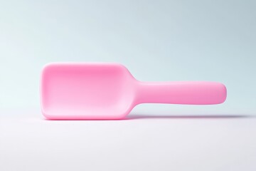 Pink plastic serving utensil