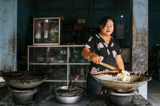 Street Food Vendor Frying Delicious Traditional Snacks in Bali