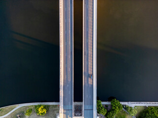 Top view of a dual bridge over water captured by drone