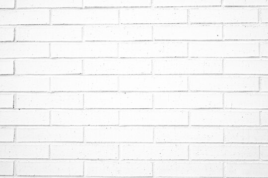 Fototapeta White brick wall texture for modern building design