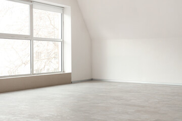 Fototapeta premium View of light wall with air conditioner in big empty room