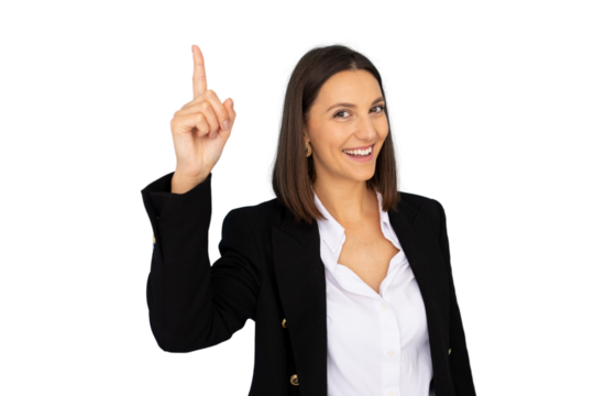 Confident businesswoman pointing upward, index finger raised, smiling broadly