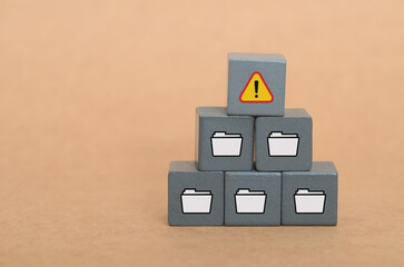Caution Data Management: White Folder and Exclamation Point Representing Critical File Error