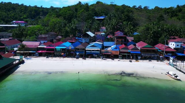 25.2.25 Rong Khm, Island village ferry pier. Smooth aerial view flight drone