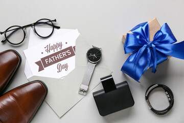 Postcard with gift box, shoes and accessories for Father's Day on white background