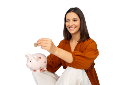 Young woman is putting a coin inside a piggy bank, concept of saving money and household budget with transparent background