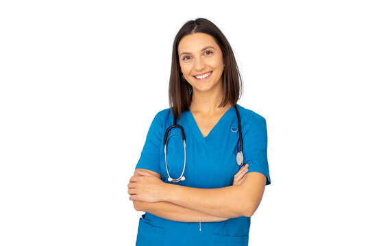 Confident medical professional in blue scrubs and stethoscope, standing with crossed arms against white backdrop
