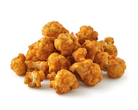Crispy curry spiced cauliflower popcorn offering flavorful plant based snack experience and guilt free indulgence