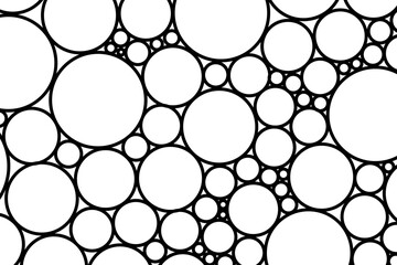 Intricate pattern of black circles on a white background creates a modern abstract design in a geometric style