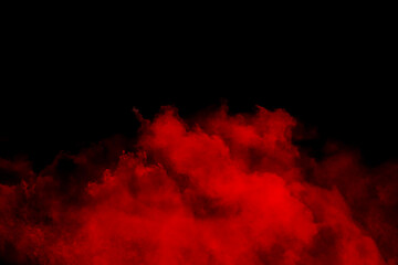 Bright red smoke in air on black background, space for text