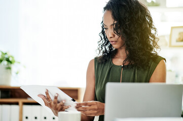 Business woman, HR and documents with laptop for corporate policy, schedule or procedures at...