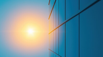 A modern glass building reflects the bright sun against a clear blue sky.