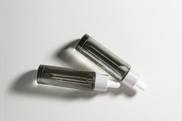 Naklejka premium cosmetics placed in the sunlit area