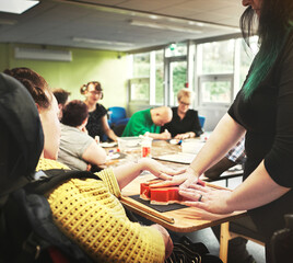 Autism, disability and children in learning classroom, art study and creative school for mental health with teacher. People hands, education or special needs students in community lesson with support