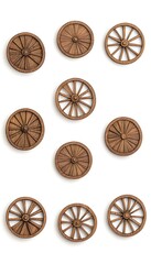 Fototapeta premium Nine miniature wooden wagon wheels arranged in a grid on a white background