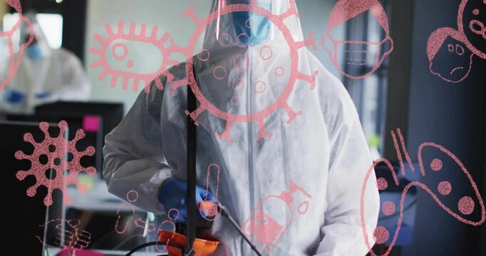 Technician wearing protective suit spraying disinfectant in lab, with floating microbe virus icons