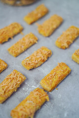 cheese cookies lined up neatly