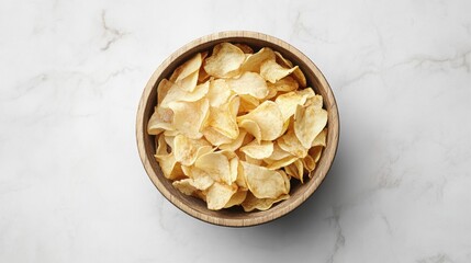 Wooden bowl filled with crispy potato chips